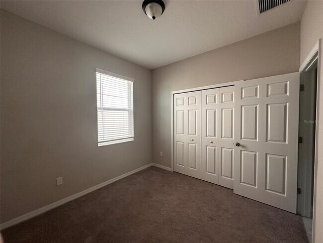 Building Photo - 7309 Pool Compass Loop