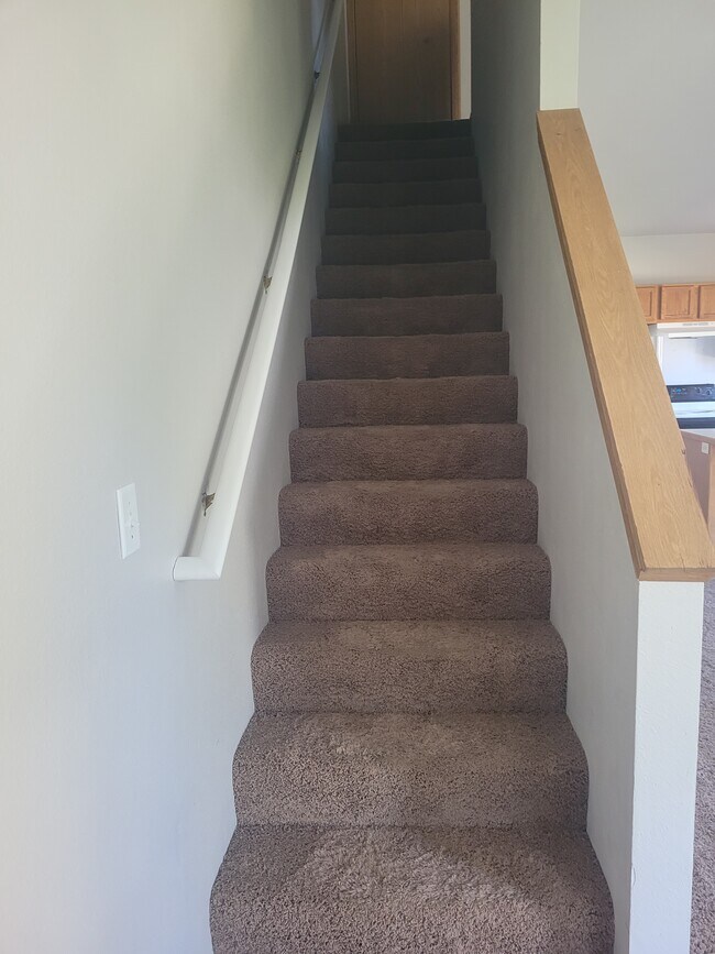 Stairs to second floor - 1415 E Maple St