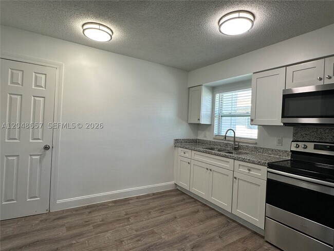 Building Photo - 2401 NW 9th Terrace