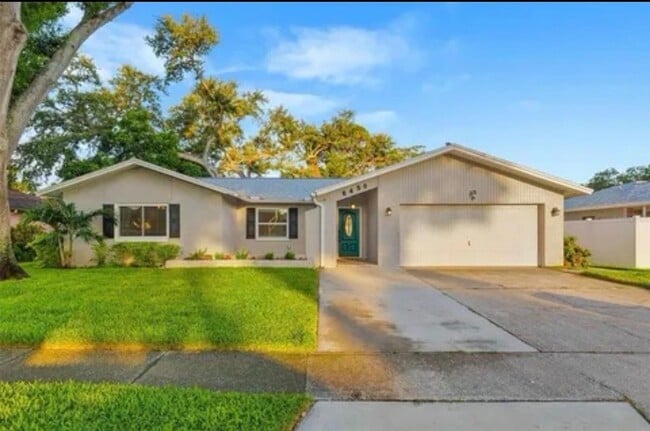 Building Photo - 6450 Woodland Blvd
