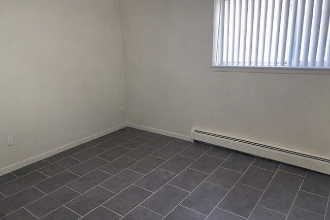 Bedroom #1 - Brown Street Apartments - 10 Min from UofM