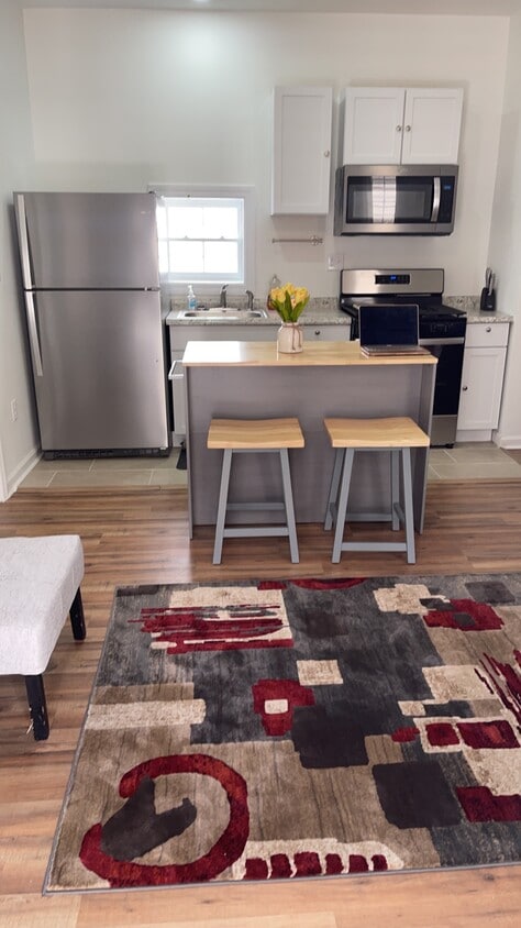 Living Room and Kitchen Area - 54 America St