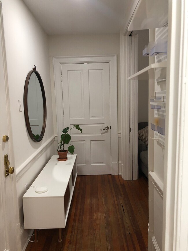 Apr. foyer with original pocket doors - 2153 California St NW
