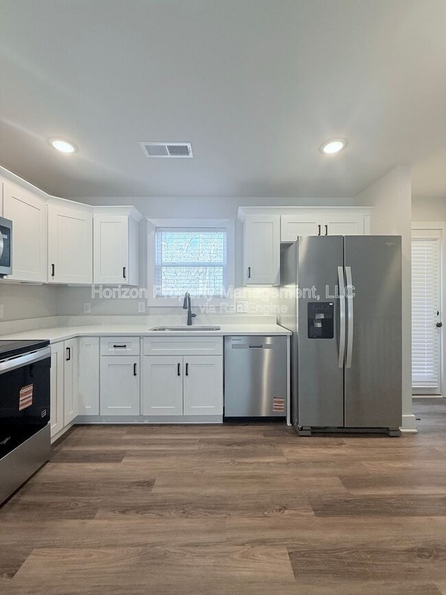 Building Photo - 7845 Wilkinson Dr