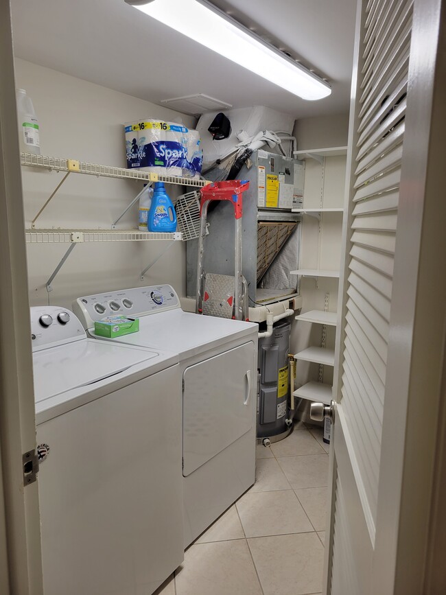 Laundry room in the unit - 4200 Belair Ln