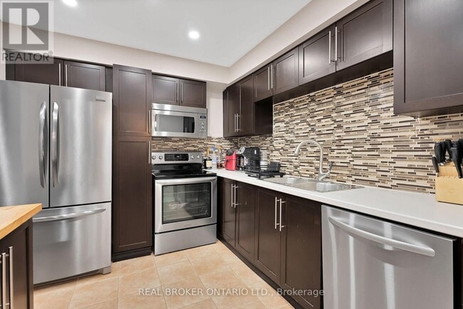 Building Photo - 7360-7360 Zinnia Pl