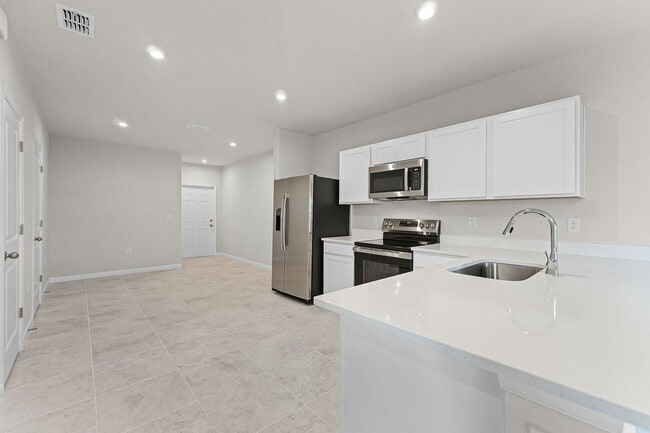Foto del edificio - Brand New ~ 3/2.5 End Unit Townhome w/ Stylish Upgrades!