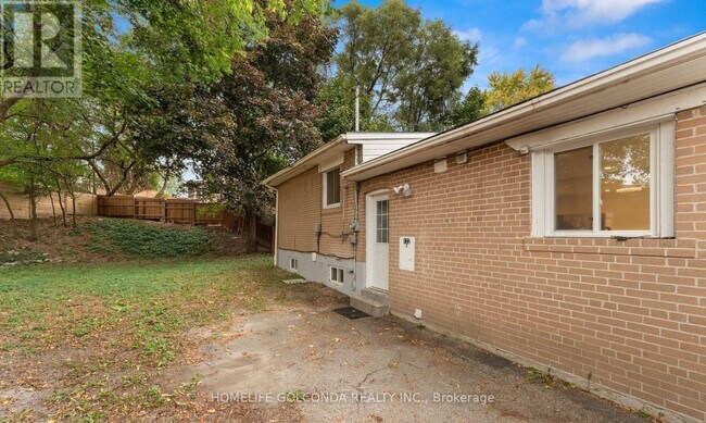 Photo du bâtiment - 122 Longford Dr