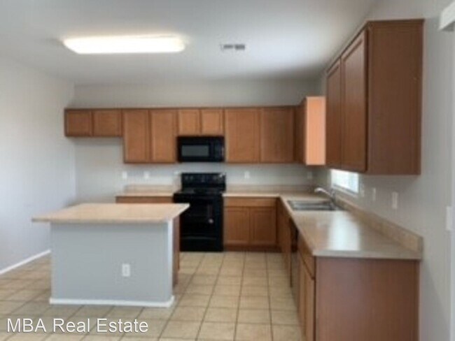 Building Photo - 4 br, 2.5 bath House - 6243 W Orchid Ln