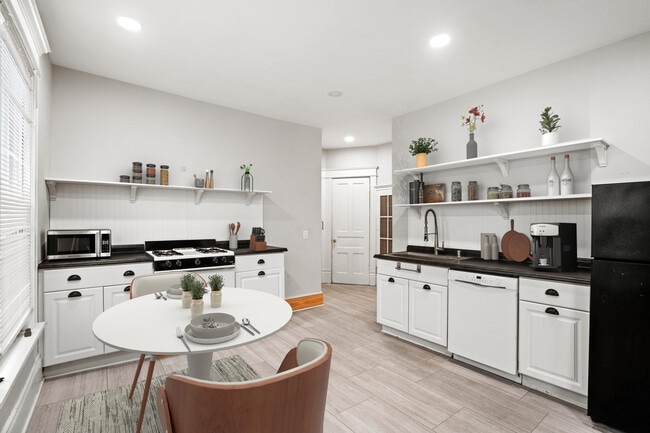 The photos with furniture have been digitally staged to show potential layout ideas. - 2531 N Murray Ave