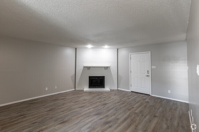 2BR, 1.5BA - 1,120SF - Living Room - Country Crest Townhomes