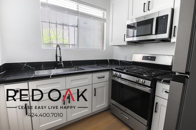 Building Photo - Wonderful, Bright, and Spacious Remodeled ...