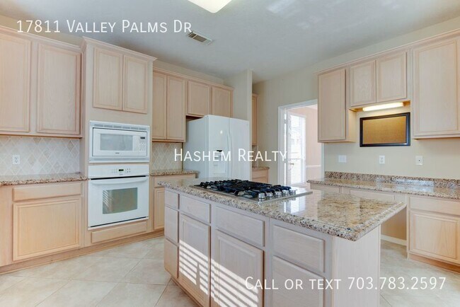 Building Photo - Spacious home boasts 4/5 bedrooms & 2 1/2 ...