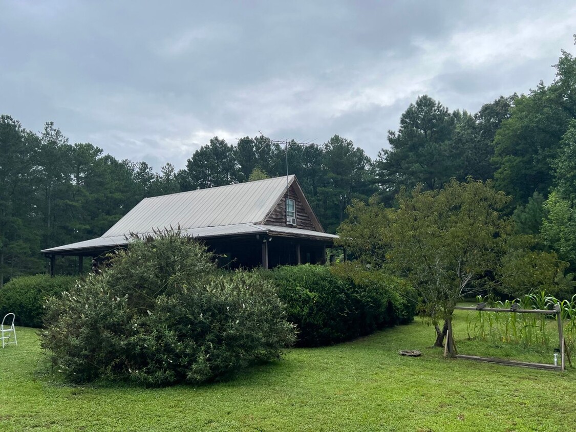 Foto principal - Log home tucked back away from it all but ...