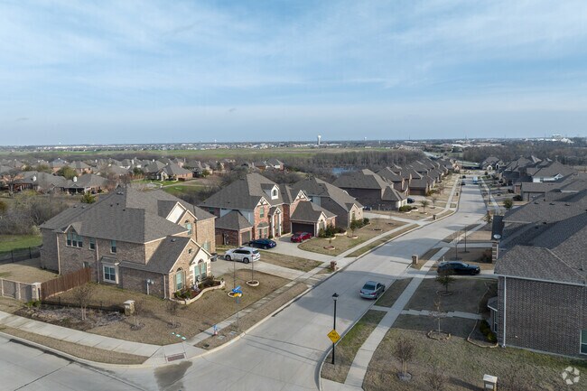 A row of larger homes in the Woodbridge new development in Sachse.