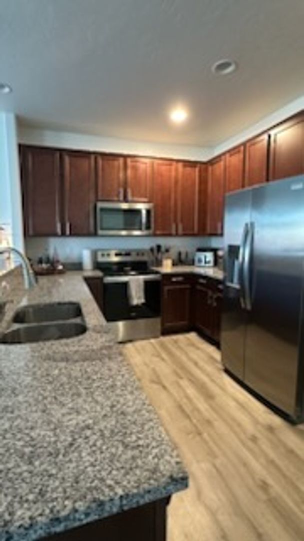 Building Photo - Upscale Townhome Haven: Designer Finishes ...