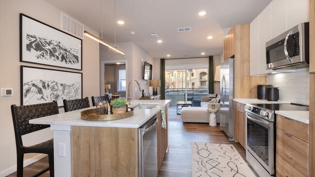 Kitchen with Stainless Steel Appliances and Quartz Countertops - Aventine Littleton