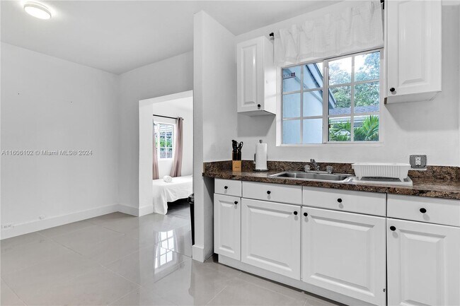 Building Photo - 6344 NW Miami Pl