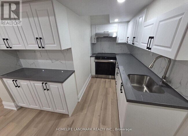 Photo du bâtiment - 1414 Wellwood Terrace