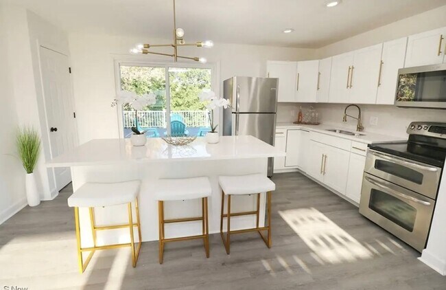 Building Photo - Remodeled Four Bedroom - Two Bath Home