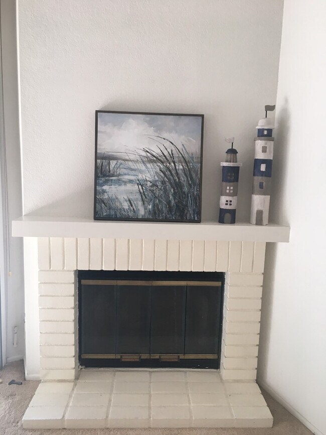 fireplace in living room - 8505 Gulana Ave