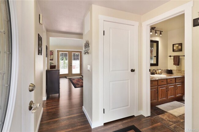Laminate & Carpet flooring, white doors and new trim throughout - 6924 Petticote Ln