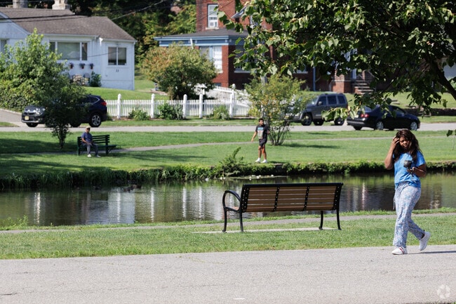 Visitors enjoy strolling around the lake at Veterans Memorial Park in Passaic, NJ.
