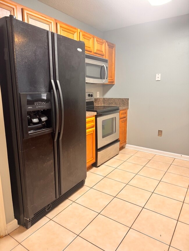 Building Photo - 6984 Ortega Woods Dr