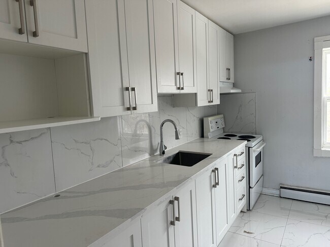 Photo du bâtiment - Recently updated 2-Bedroom Apartment for Rent in Oshawa