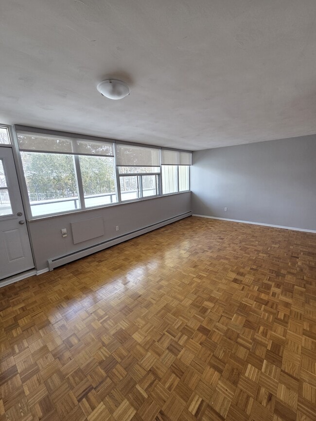 Building Photo - 1061 Queen's Blvd