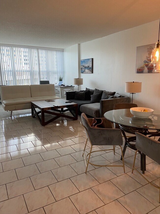 Spacious Living room , queen size futon and large comfortable couch - 1801 S Ocean Dr
