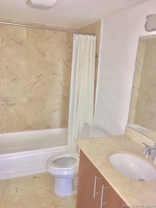 Building Photo - 10275 Collins Ave