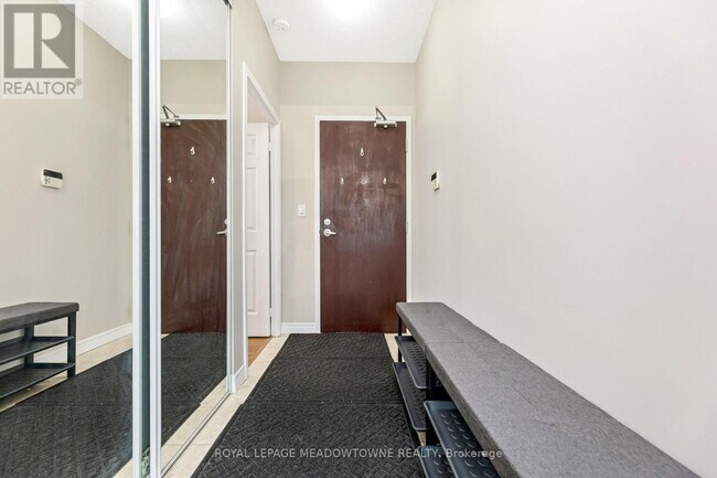 Building Photo - 208-3208 Enfield Pl