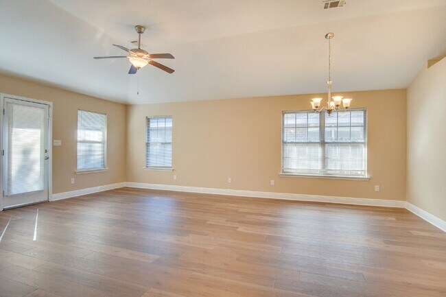 Building Photo - Spacious Brick 3BR/2BA Home with Open Floor Plan, Primary Suite, 2-Car Garage & Fenced Backyard N...