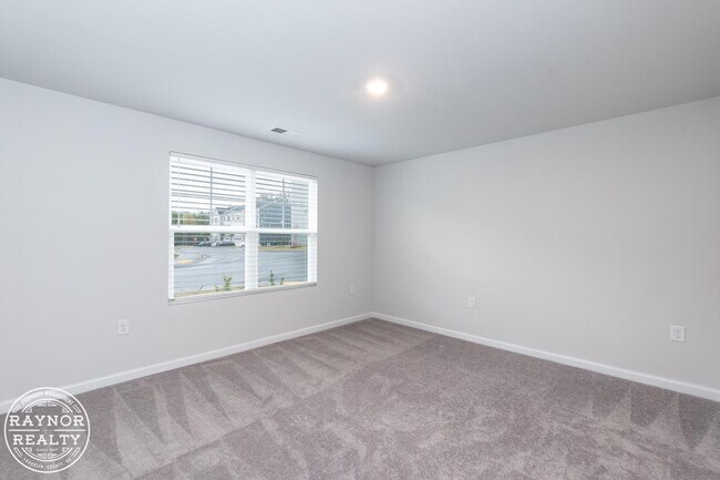 Building Photo - Elegant corner townhome