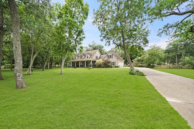 Foto del edificio - 5318 E Plantation Oaks Dr