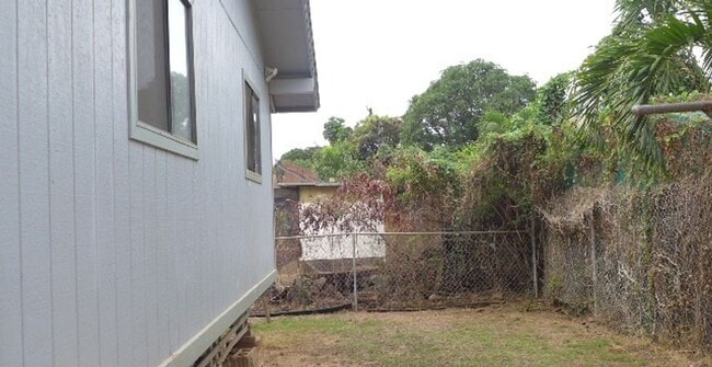 Foto del edificio - Three Bedroom Home