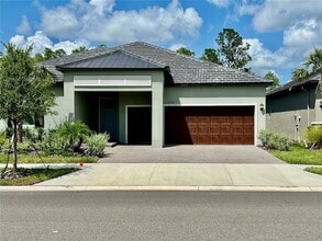 Building Photo - 10864 Banyan Breeze Blvd