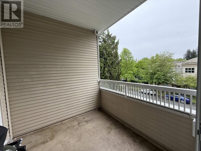 Photo du bâtiment - 307-91019 McMyn Rd