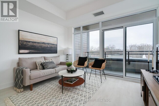 Building Photo - 1285 Queen St E