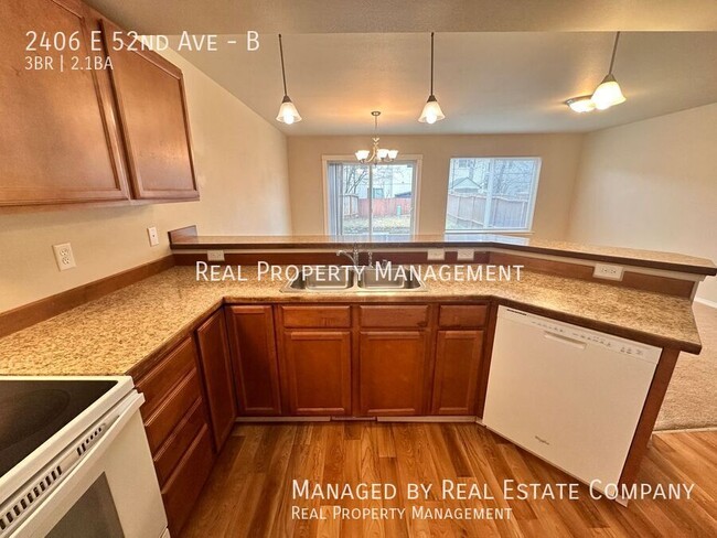 Building Photo - 2406 E 52nd Ave