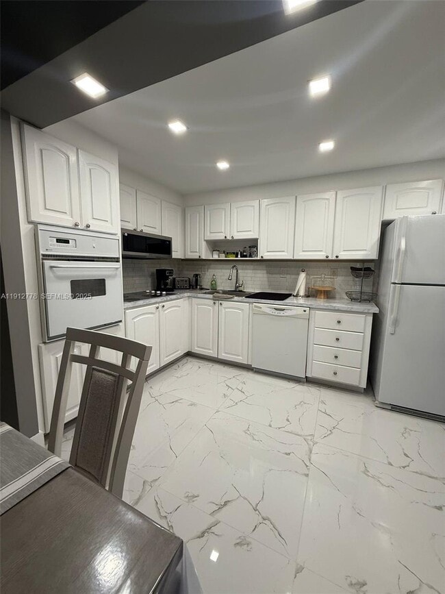 Building Photo - 19380 Collins Ave