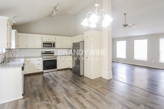Building Photo - NEW LOWER RENTAL RATE LEASING SPECIAL: Rec...
