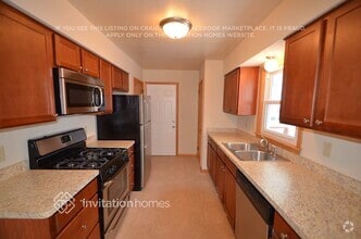 Building Photo - 5900 Aquila Ave N