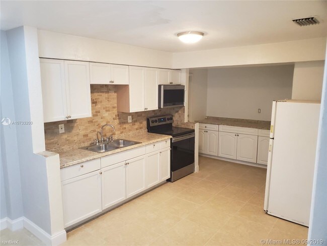 Building Photo - 3 br, 2 bath House - 5820 NW 14th Ct