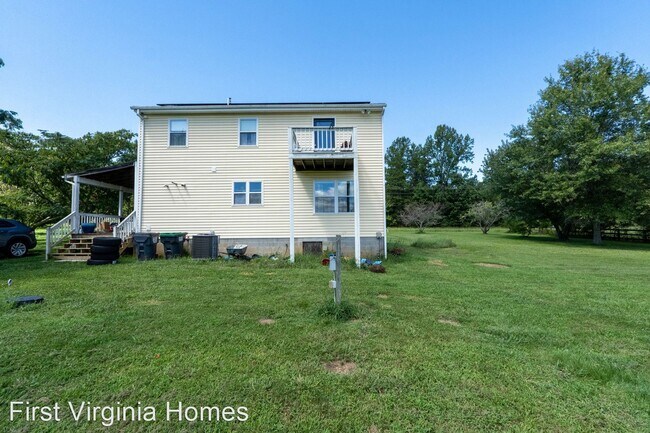 Building Photo - 3 br, 2.5 bath House - 6942 West River Rd