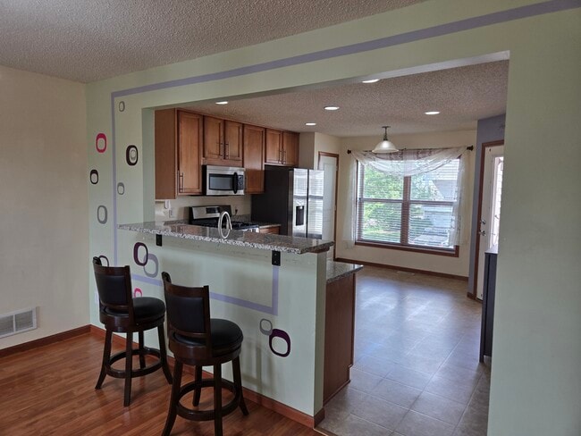 Kitchen view from living room - 15205 French Dr N