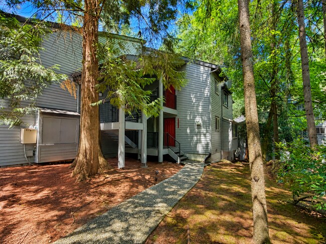 Building Photo - Modern Wooded Condo with Upgraded Kitchen & Private Deck