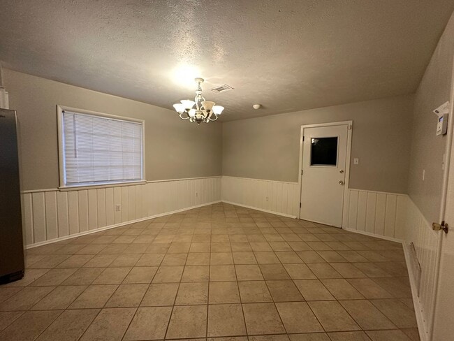 Building Photo - Large home with updates
