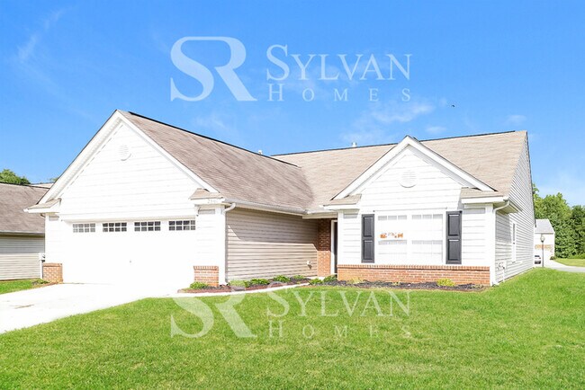 Building Photo - This adorable home is ready for your personal touch!